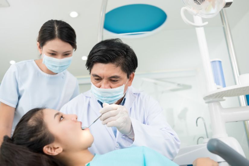 Nên điều trị viêm nha chu ở bệnh viện hay phòng khám tư?