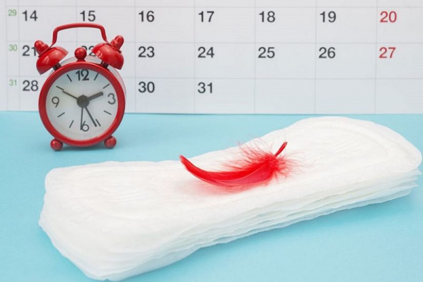 Trồng răng trong kỳ kinh nguyệt: Nên hay không nên?